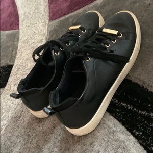 Ado black and gold sneakers
